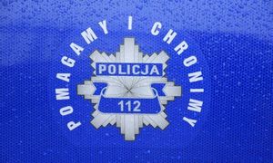 policyjna gwiazda z napisem policja pomagamy i chronimy