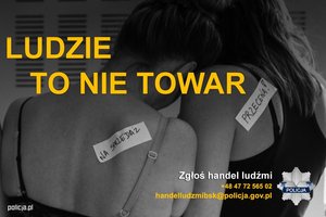 Plakat z żółtym napisem ludzie to nie towar